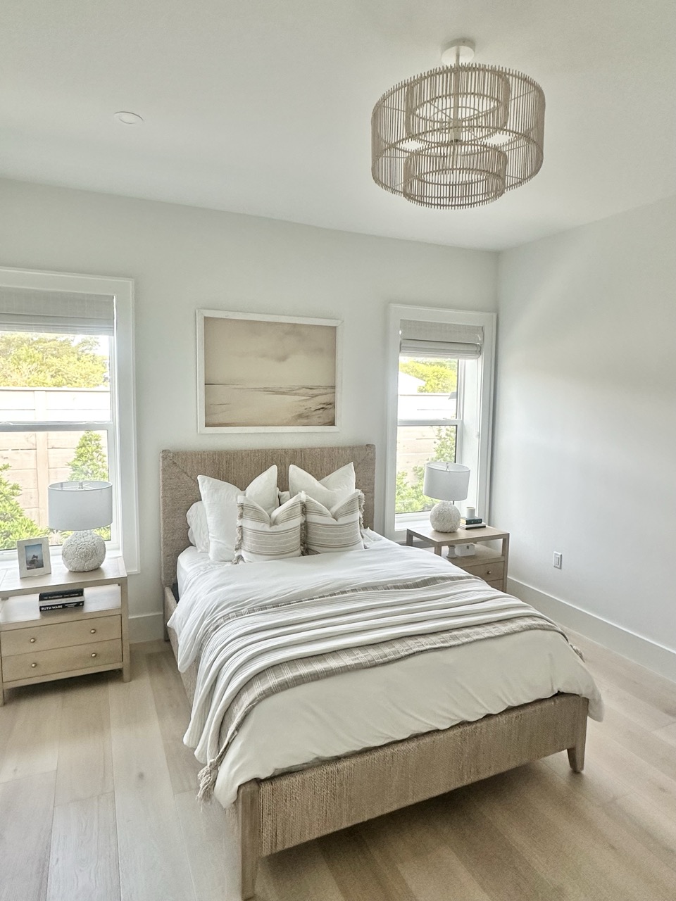 Curated coastal bedroom with sourced furniture